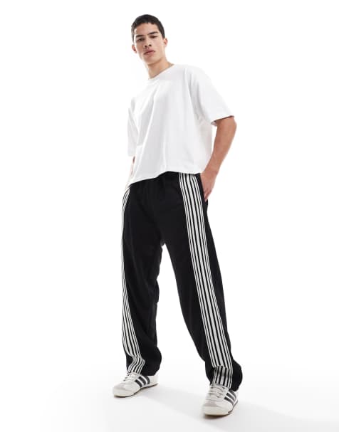 Pull&Bear – Czarne joggersy z szerokimi nogawkami i paskami - view 1