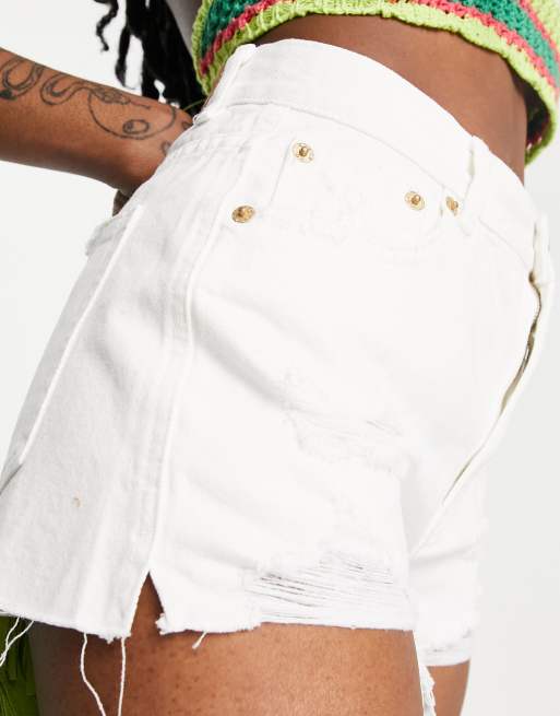 White shorts with on sale rips