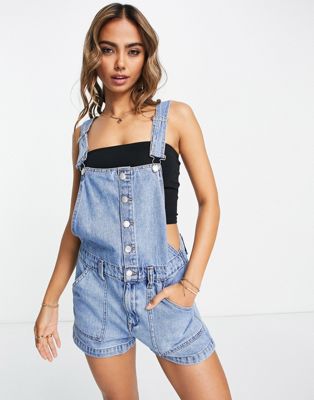 Pull&Bear dungaree denim playsuit with button front detail in blue
