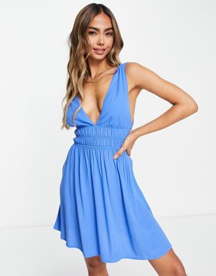 Pull&Bear elasticated waist mini dress with open back detail in blue