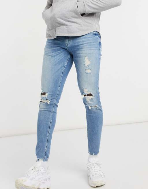 Pull&Bear – Eng geschnittene Premium-Jeans in Dunkelblau mit Zierrissen