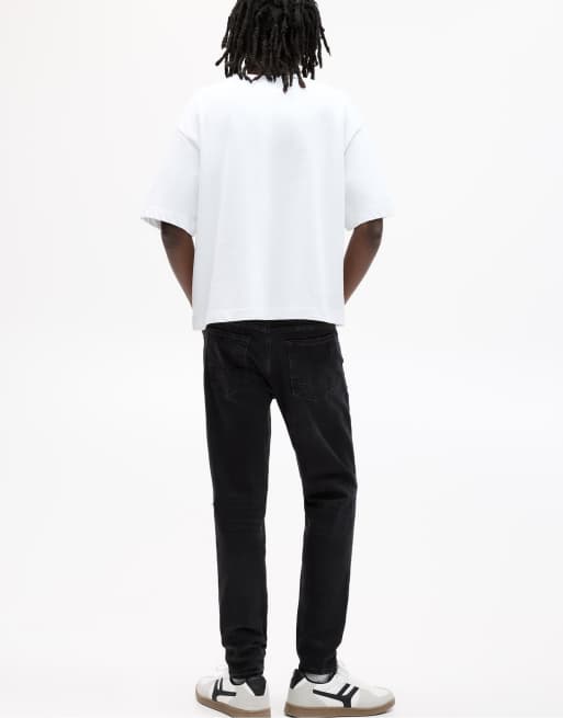 Pull&Bear – Enge Jeans in verblasstem Schwarz mit Zierrissen, 2 von 4