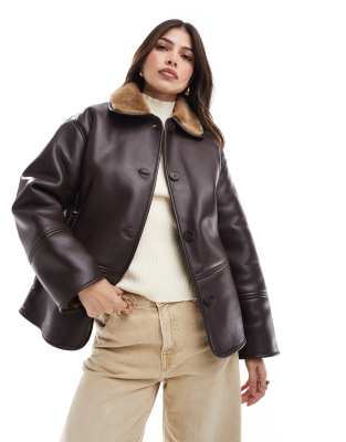 faux leather coat with contrast shearling collar in dark brown