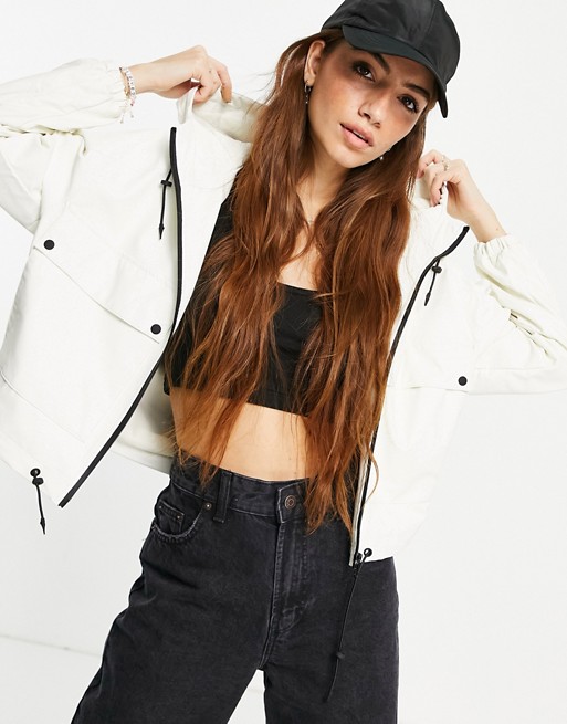 Pull&Bear raincoat jacket with pockets and hood in white with contrast zip