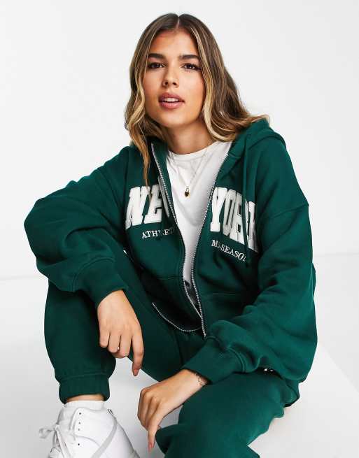 Pull&Bear - Felpa oversize verde con zip, cappuccio e scritta sul davanti in coordinato