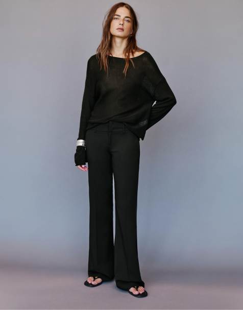 Pull&Bear Flared trousers with belt loops in black - view 1