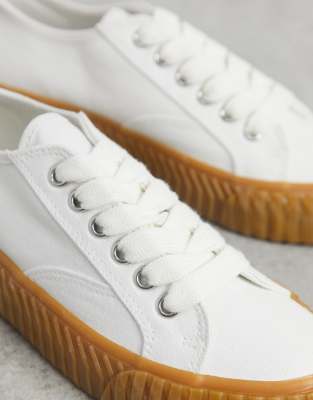 white sneakers with brown sole