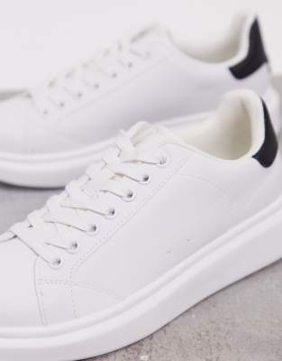 white trainers with black back