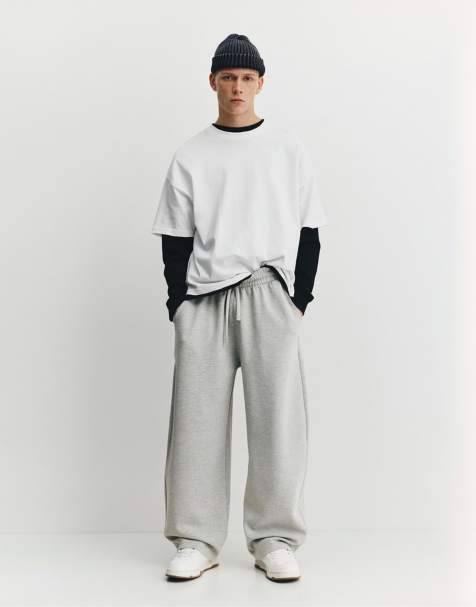 Pull&Bear – Gråmelerade, dubbelstickade träningsbyxor med ballongben - view 1
