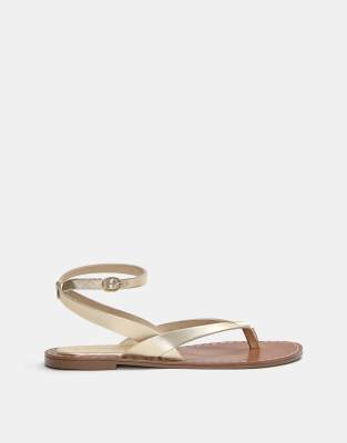 Pull&Bear – Guldfärgade, platta sandaler i läder - view 1