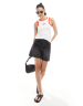Pieces racer neck tank top with embroidered cherry graphic in white