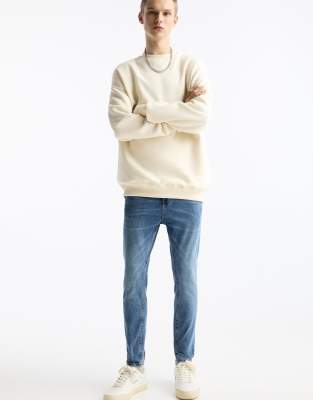 Jean coupe carotte - moyen dlav - Pull & bear - Modalova