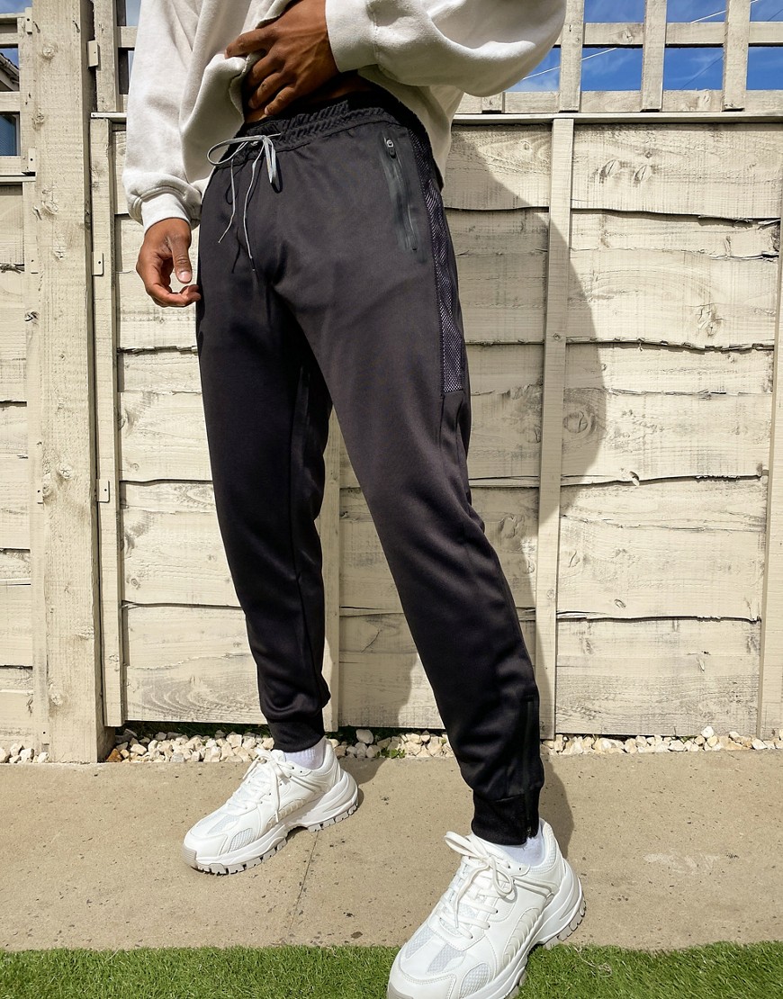 Pull & Bear jogger with zip pockets in black