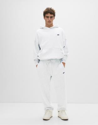 Jogginghose in Eisblau mit „STWD"-Print-Weiß Weiß S