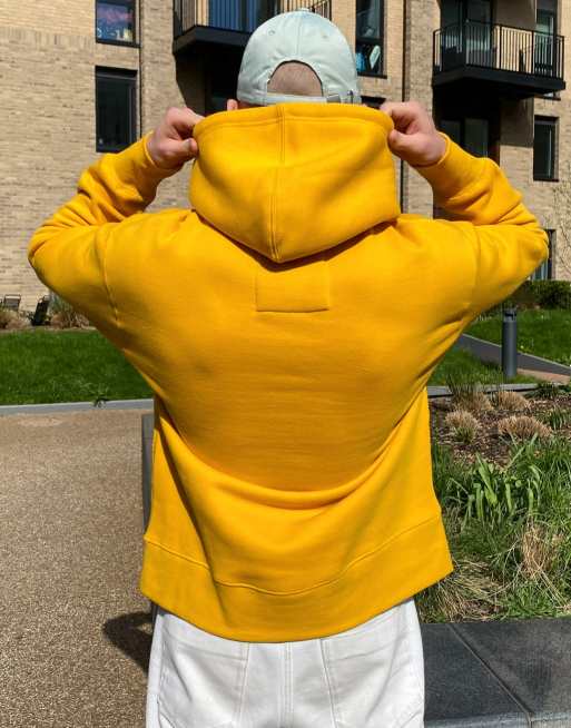 Yellow pull and store bear hoodie