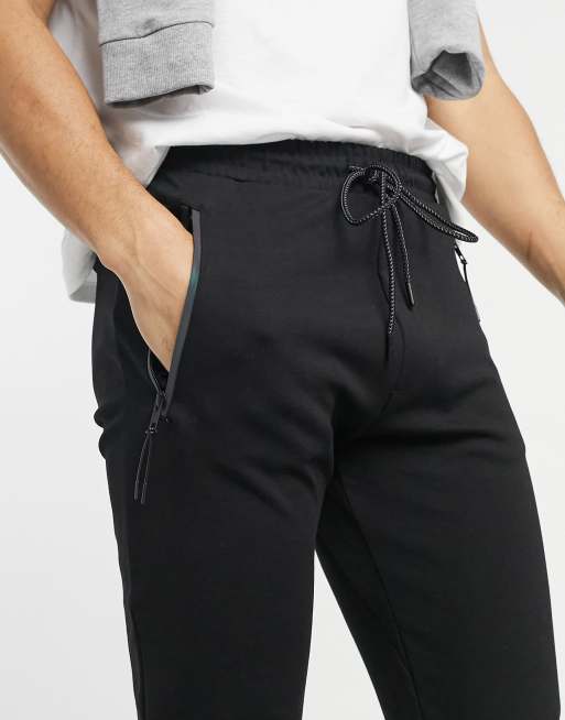 Pull Bear Join Life joggers with zip pockets in black