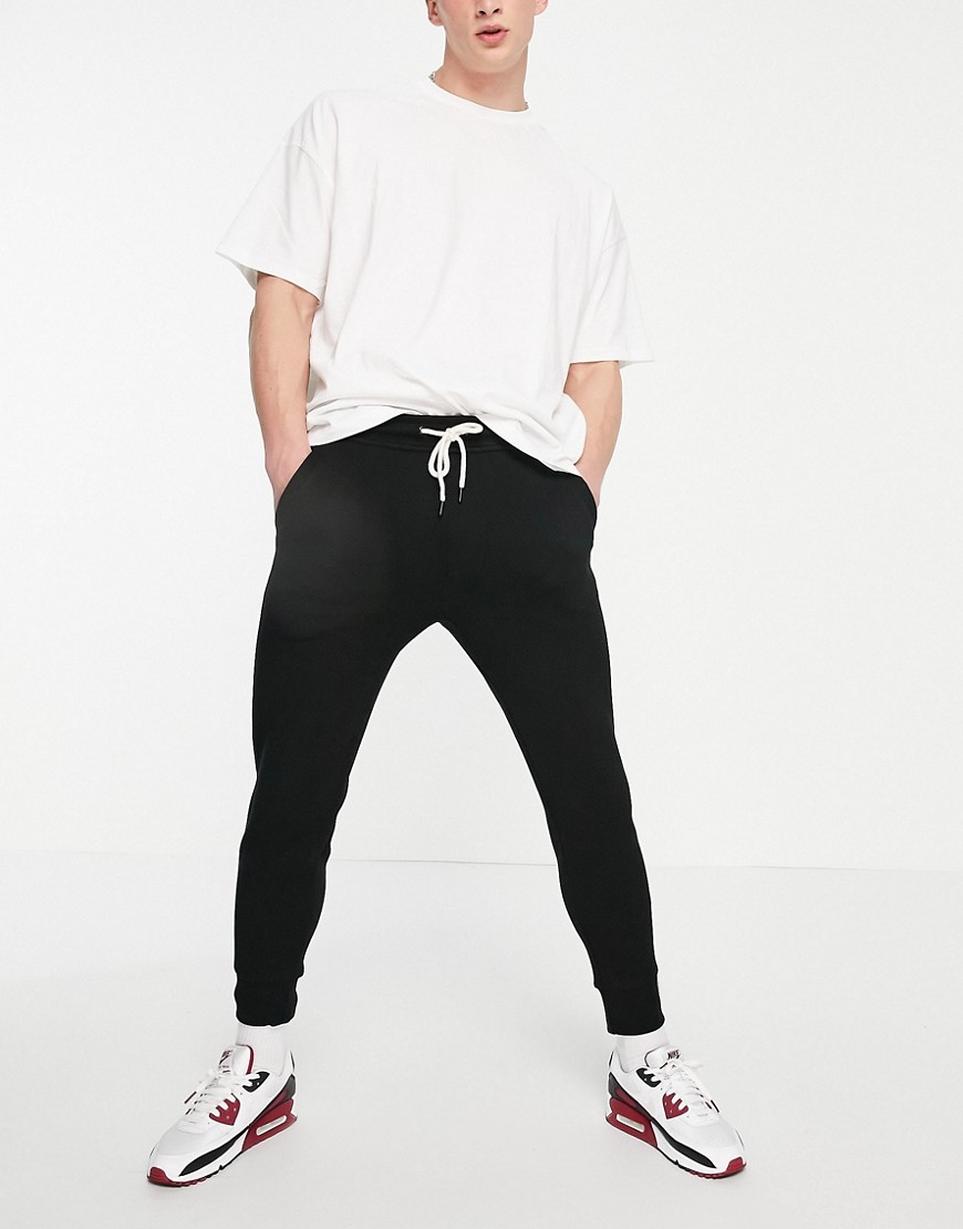 Pull & Bear Join Life pique sweatpants in black