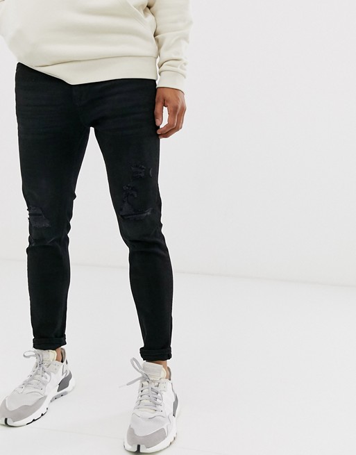 Pull&Bear Join Life tapered carrot fit jeans with knee rips in black