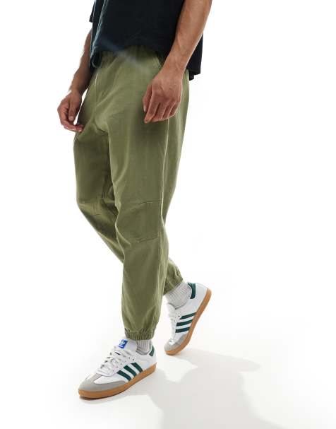 Pull&Bear – Kakifärgade, baggy byxor med muddar - view 1