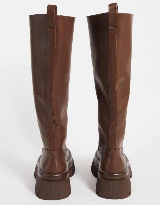 Flat brown knee outlet length boots