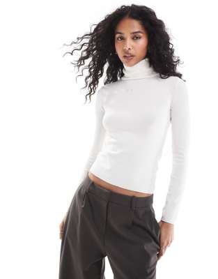 knit polo neck sweater in ecru-White