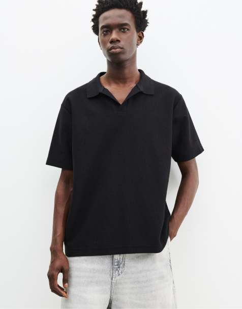 Pull&Bear – Kurzärmliges, strukturiertes Polohemd in Schwarz - view 1