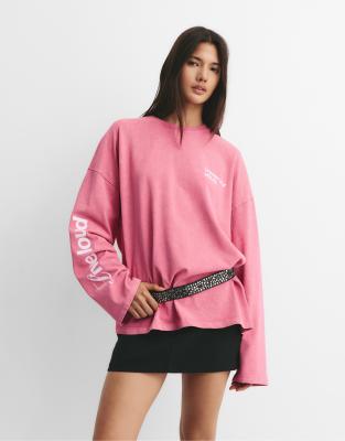 Pull & Bear - Langärmliges Shirt in verblasstem Rosa mit Slogan-Textprint