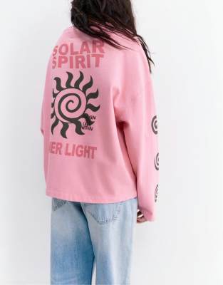 Pull & Bear - Langarmshirt in Rosa mit Sonnenprint