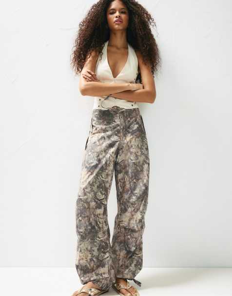 Pull&Bear Leaf print parachute trousers in brown