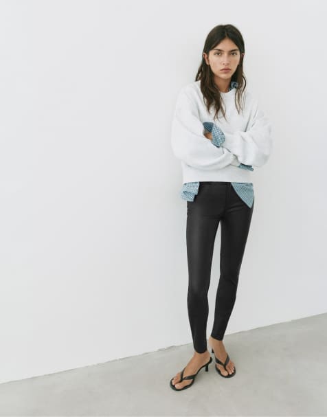 Pull&Bear Leather effect skinny trousers in black - view 1
