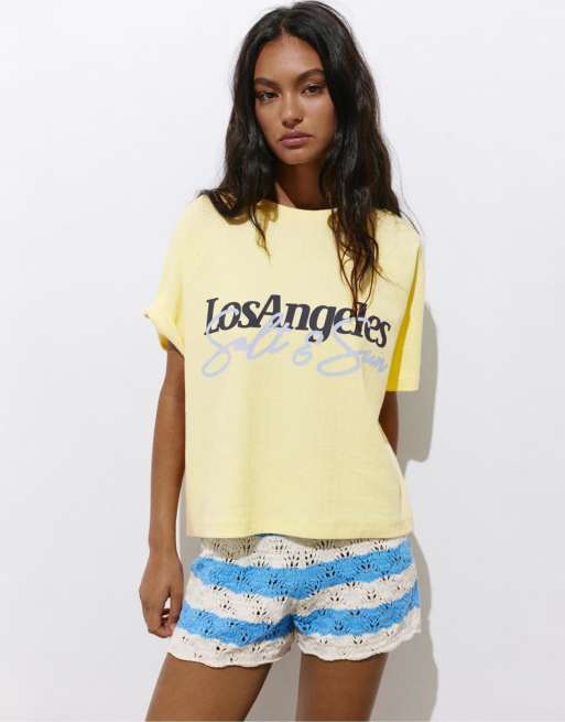 Pull&Bear Los angeles hibiscus floral t-shirt in light yellow | ASOS