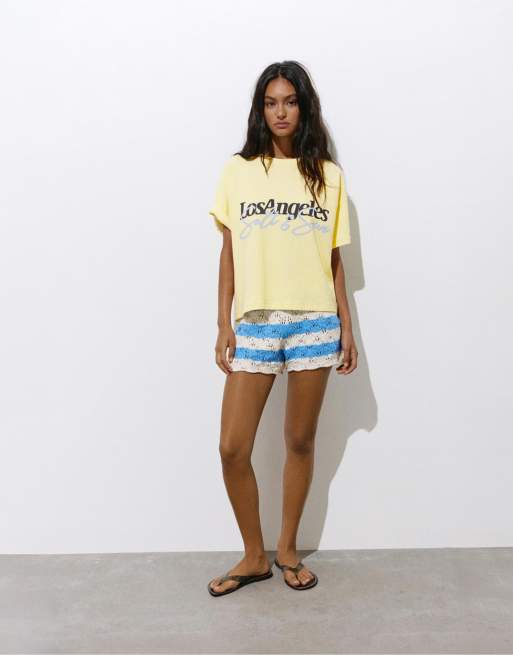 Pull&Bear Los angeles hibiscus floral t-shirt in light yellow | ASOS