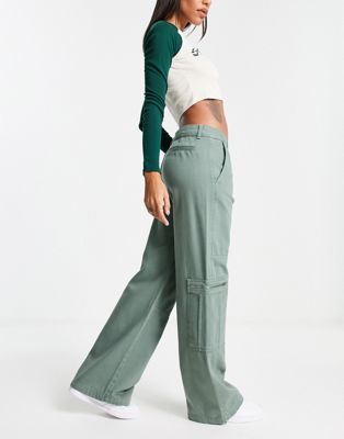 Pull&Bear low rise cargo trousers in green with zip pocket detail