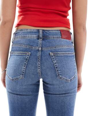 Pull&Bear low rise flare jeans in mid blue wash