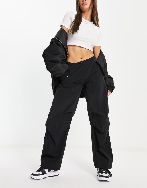 ASOS DESIGN Petite parachute cargo pants in black