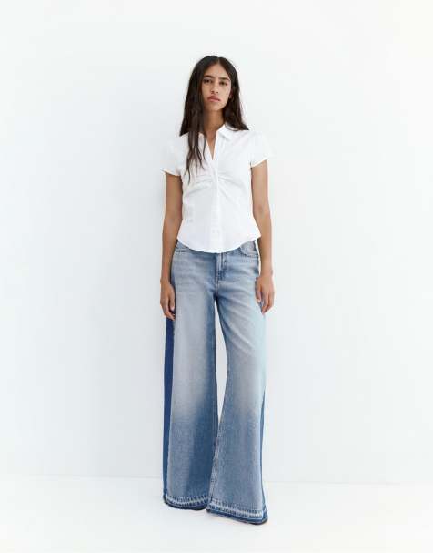 Pull&Bear – Mellanblå jeans med vida ben och lappade detaljer - view 1