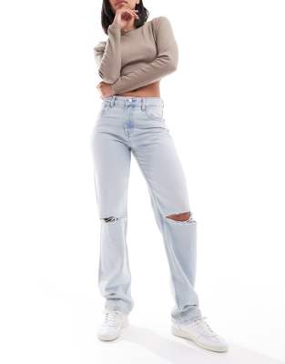 mid rise straight leg jeans with knee rips in bleach blue