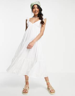 mid length white dress with sleeves