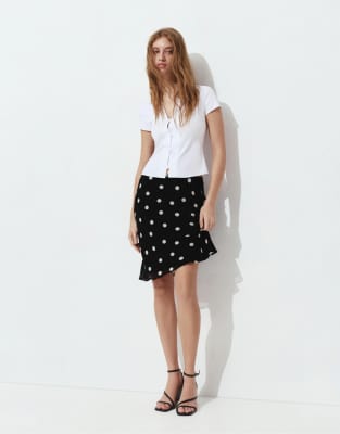Pull & Bear - Mini-jupe à pois - Noir