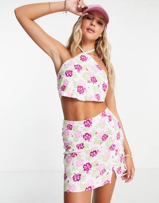 Pull & Bear - Minirock mit rosa Blumen-Print und hohem Bund