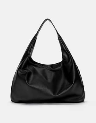 Pull & Bear - Mit Nieten besetzte Handtasche in Schwarz