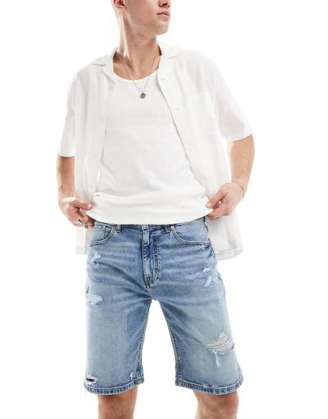 Pull&Bear – Niebieskie, dopasowane szorty jeansowe z rozdarciami - view 1