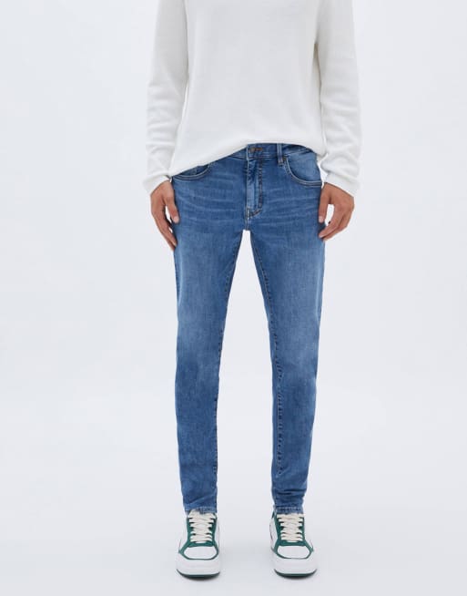 Pull&Bear – Niebieskie jeansy o obcisłym kroju