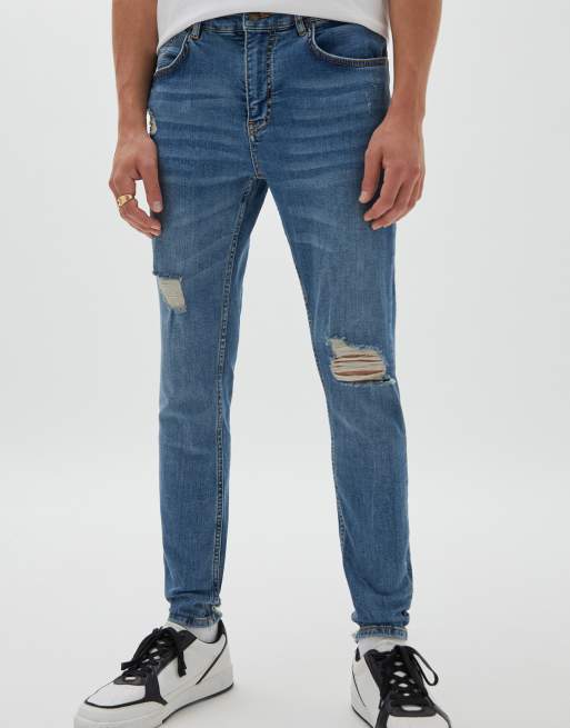 Pull&Bear – Niebieskie jeansy premium o obcisłym kroju z przetarciami