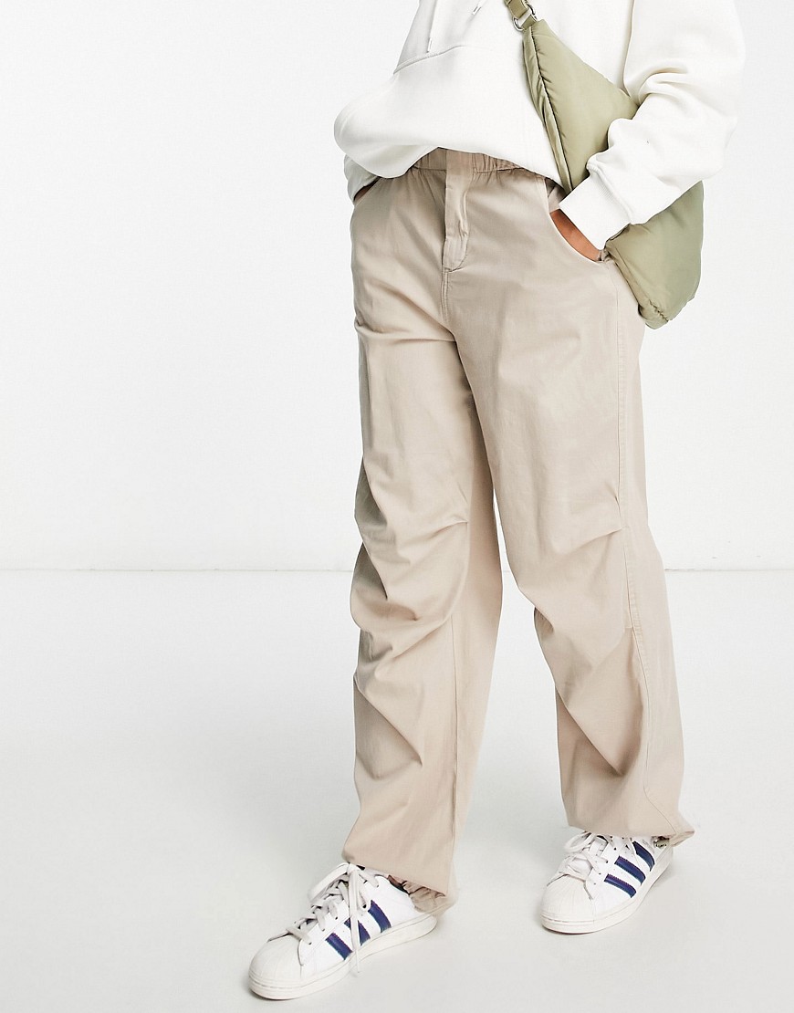 Pull & Bear nylon cargo parachute trousers in beige-Neutral