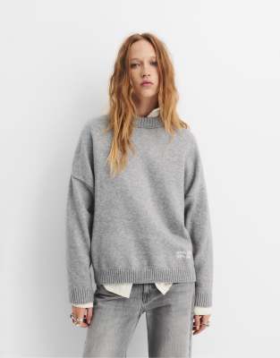 Pull & Bear - Oversize-Pullover in grau meliert mit Schrift
