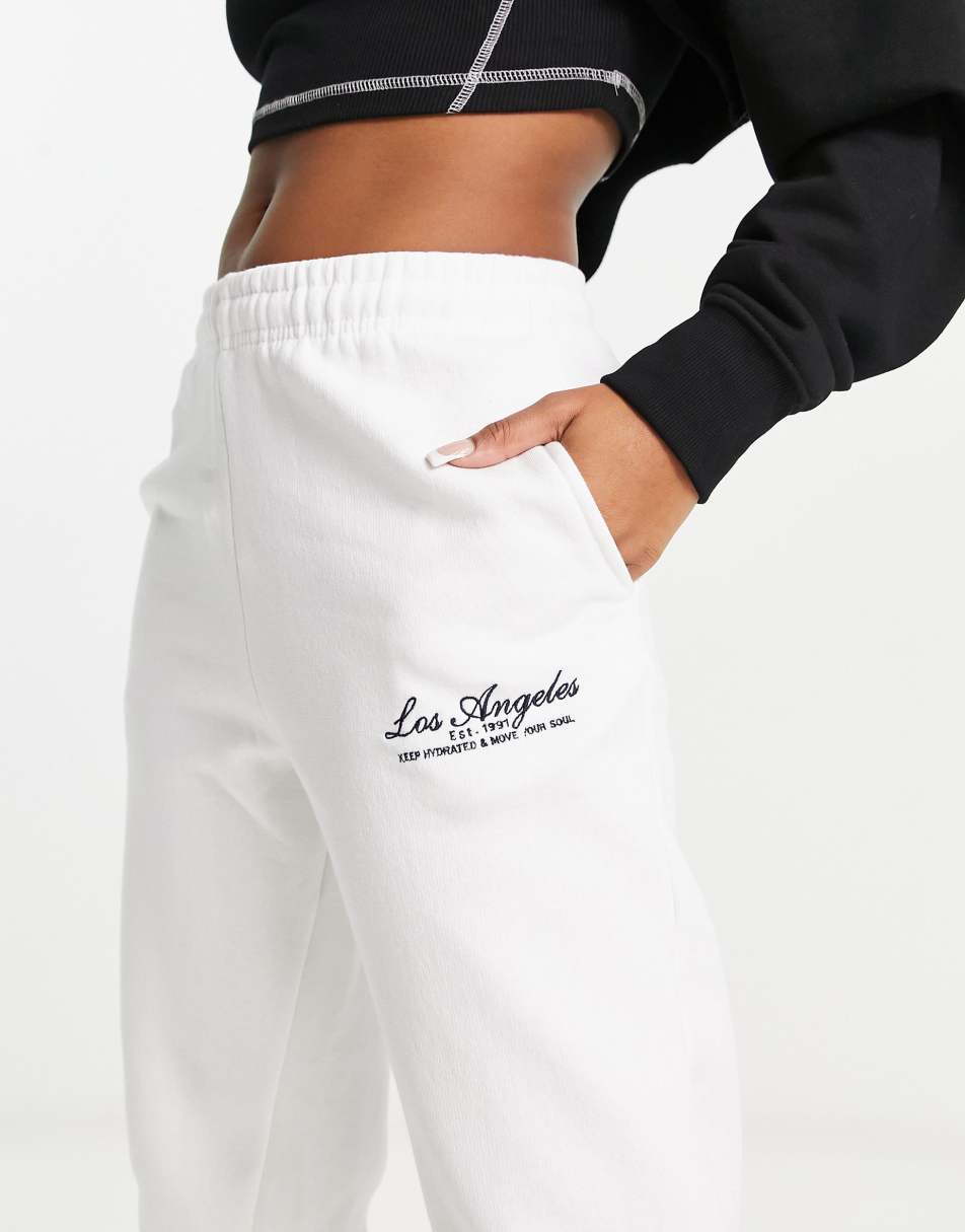 Pull&Bear oversized Los Angeles slogan joggers co-ord in white