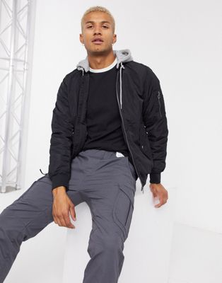 Pull&Bear padded bomber jacket with jersey hood in black | ASOS