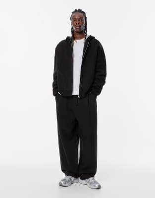 Pull & Bear - Pantalon de survêtement bouffant en maille interlock - Noir
