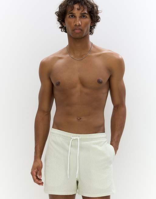 Pull&Bear - Pantaloncini da bagno in seersucker verde pallido a righe